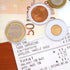 Adjustable clear coin holders displaying different coin sizes