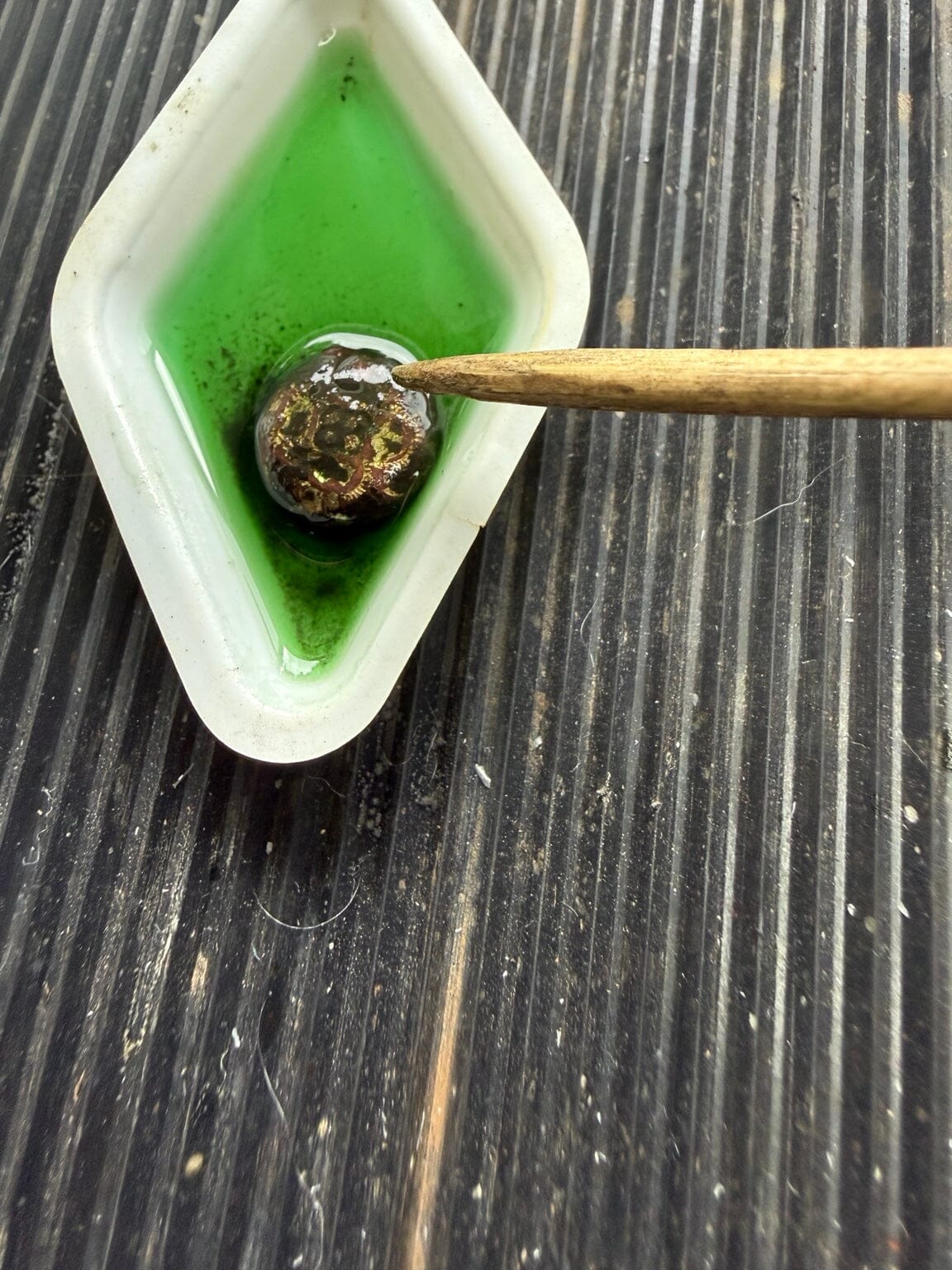 Renaissance Metal De-Corroder removing corrosion from a metal relic
