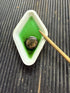 Close-up of relic soaking in Renaissance Metal De-Corroder solution
