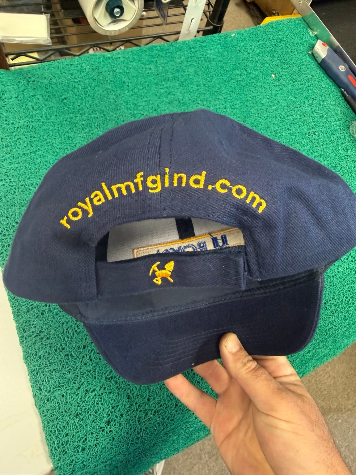 Royal Manufacturing navy hat rear adjustable strap and embroidery