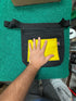 Large mesh dive recovery bag shown with hand for size reference