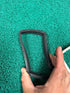 Used black soft 3D-printed Equinox 600 800 protective bumper in hand
