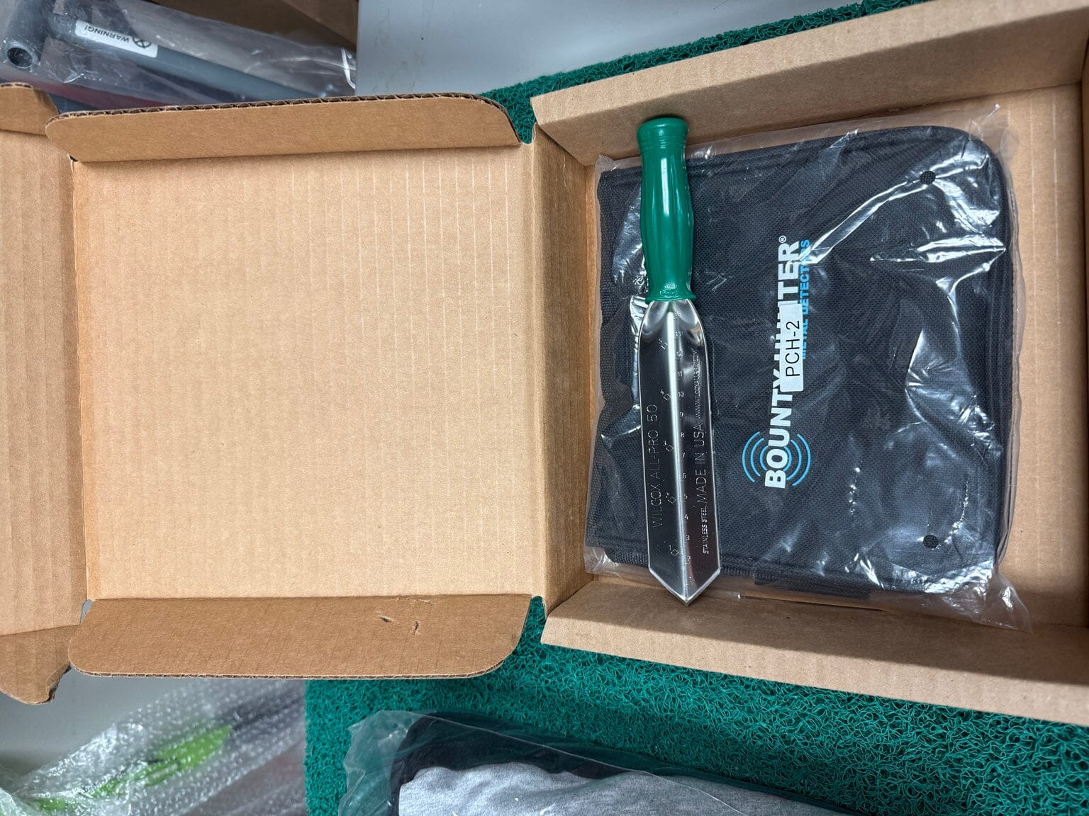 Open box Bounty Hunter pouch and Wilcox All-Pro 50 digging tool kit