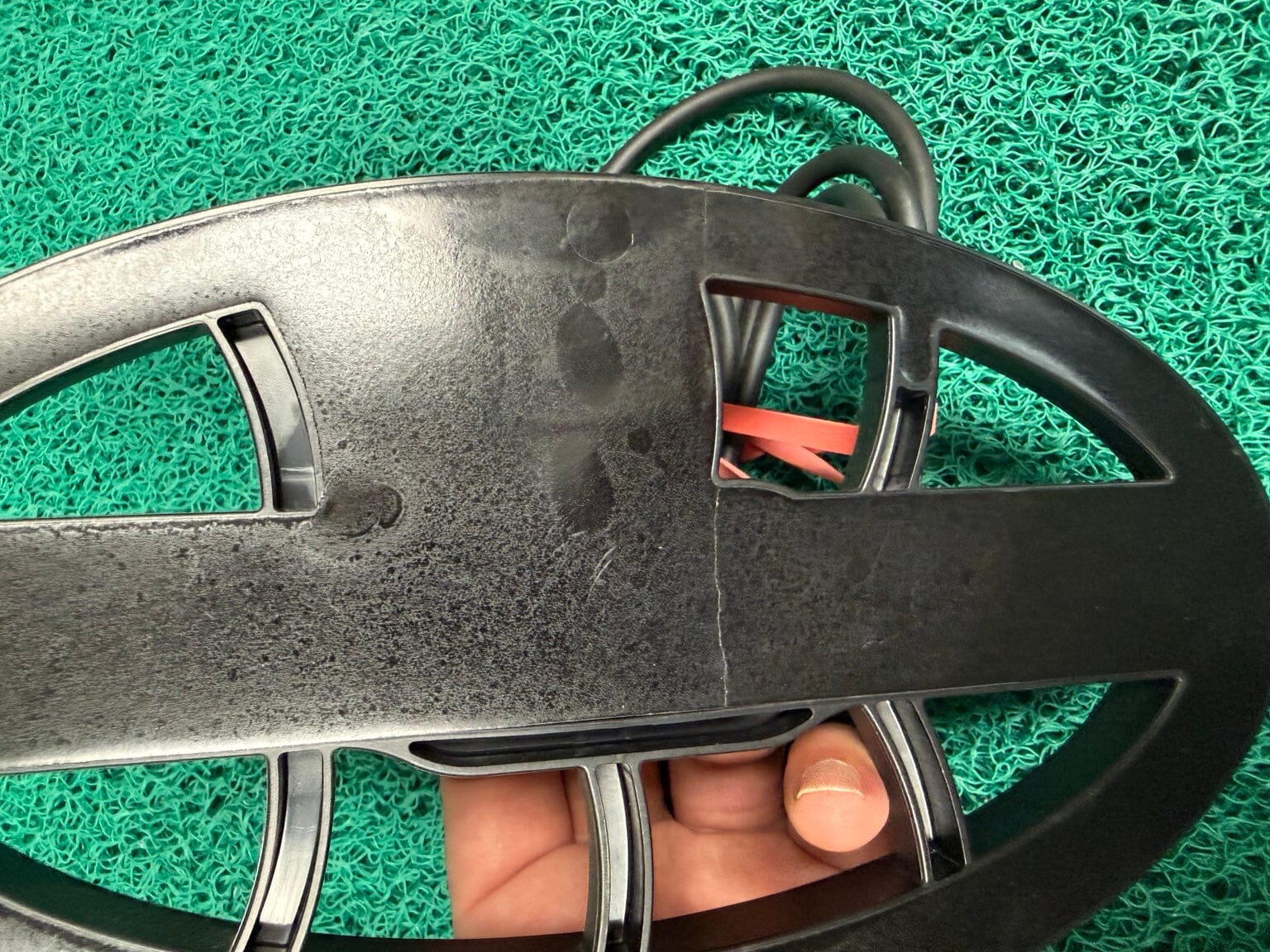 Coiltek search coil underside showing cosmetic shipping damage