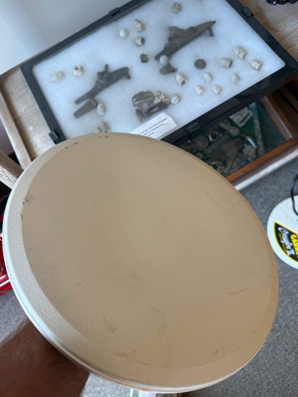 Bottom of used Garrett Crossfire II search coil showing condition
