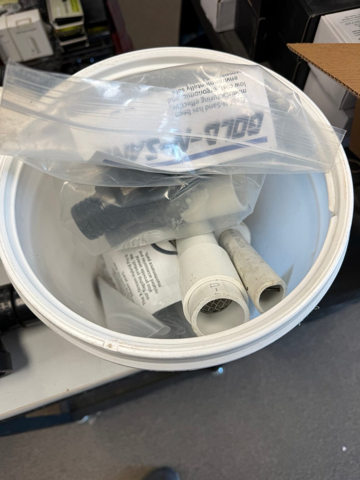 Gold-N-Sand prospecting kit components inside bucket