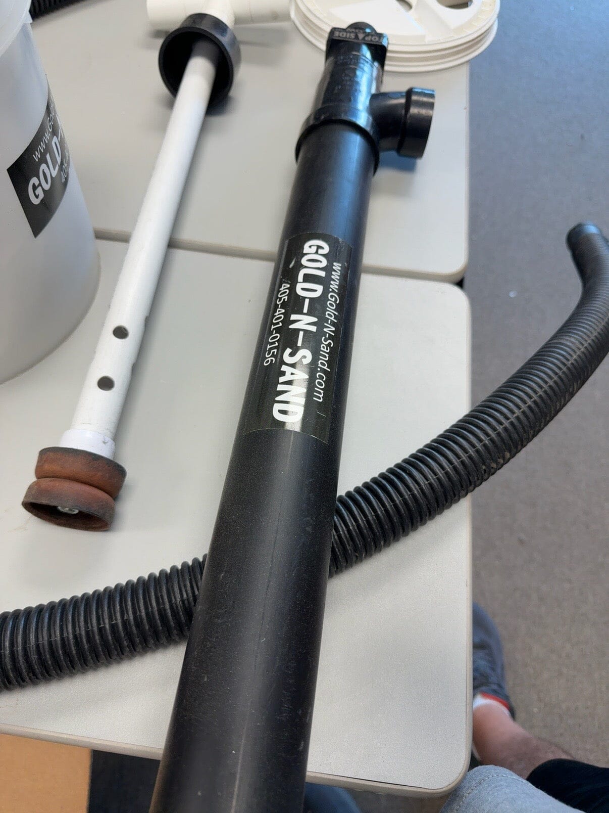 Gold-N-Sand hand pump and flexible hose from slightly used return