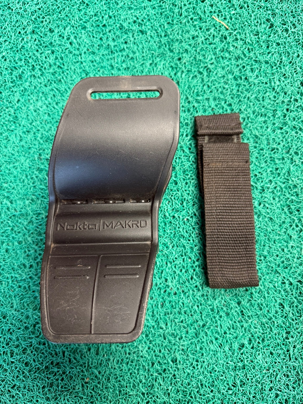 Slightly used original Nokta Makro replacement armrest with strap and screws