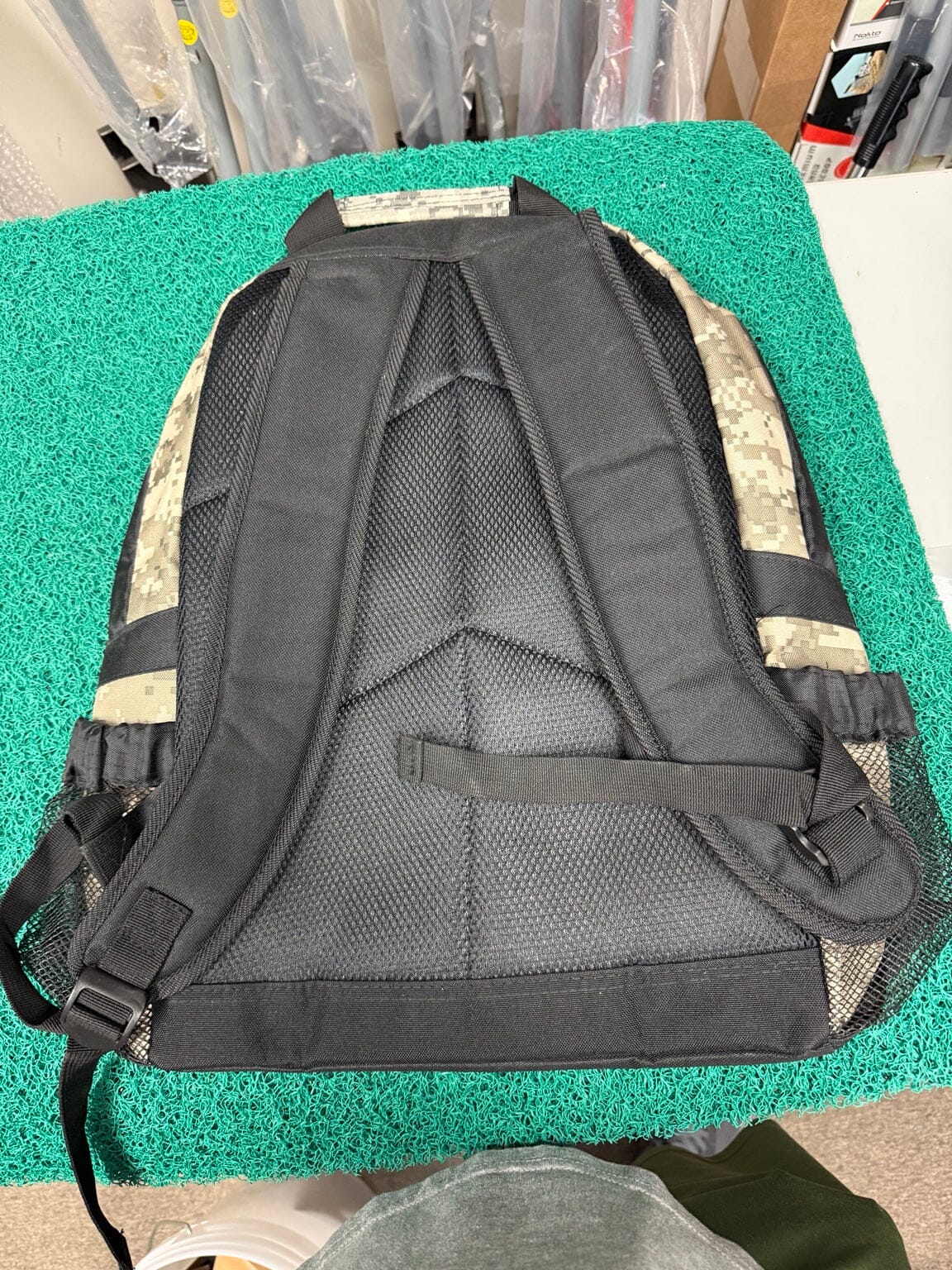 Used Teknetics metal detector backpack back view with padded straps